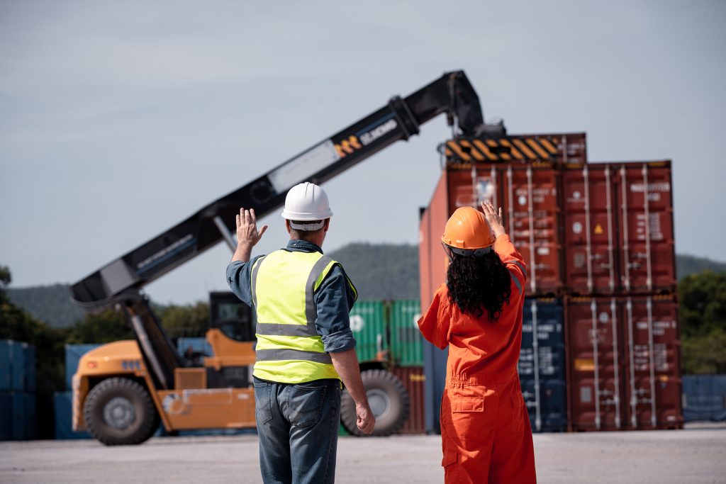 engineer-worker-under-working-with-fork-lift-conta-6WZ2WJ4g.jpg